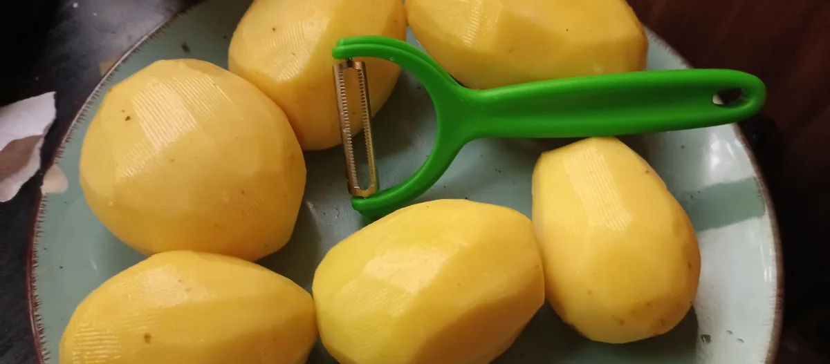 Just a Simple Chipped Plate with Peeled Potatoes: The Everyday Struggle