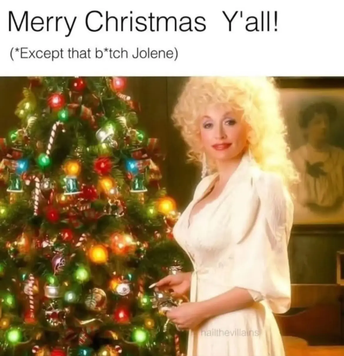 A woman with voluminous blonde curls and a white dress stands beside a brightly lit, ornamented Christmas tree. The overlaid…