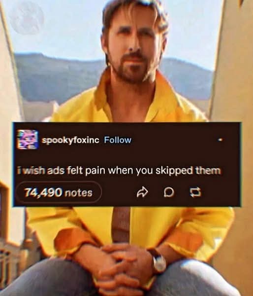 A man in a yellow shirt sits outdoors with mountains in the background, overlaid with a Tumblr post from 'spookyfoxinc' that…