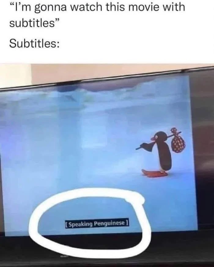 A photo of a TV screen showing an animated penguin character walking on ice while carrying a sack on its shoulder. Below the…