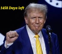 A photo of Donald Trump in a blue suit and yellow tie, smiling and raising his right fist, standing before a microphone with…