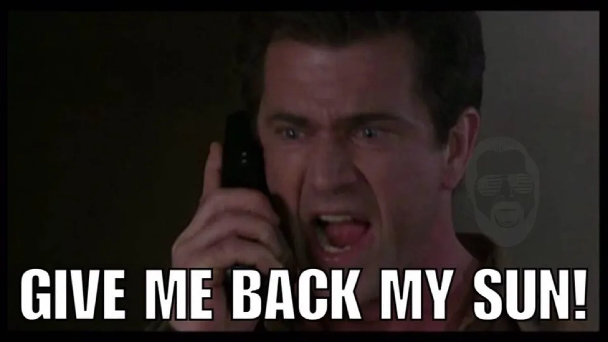 A man with dark hair is screaming into a black phone receiver, his face contorted in rage. Behind him, a faint, translucent…