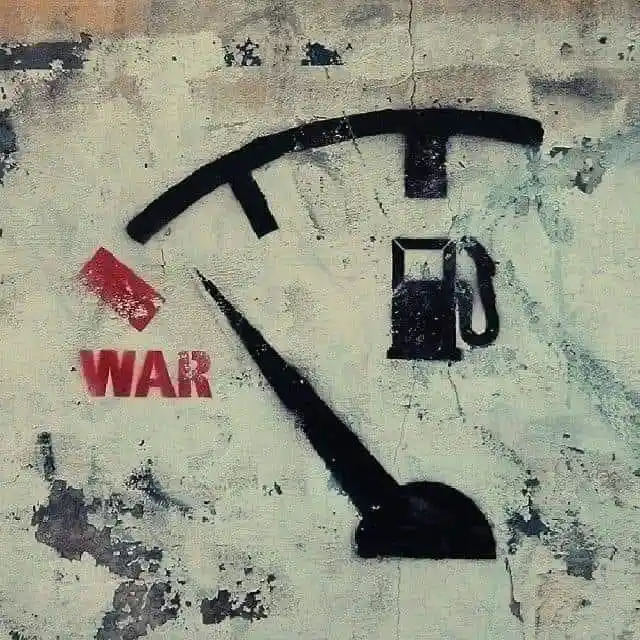A weathered, textured surface resembling a gas gauge with a needle pointing toward the 'E' (empty) mark. The word 'WAR' is…
