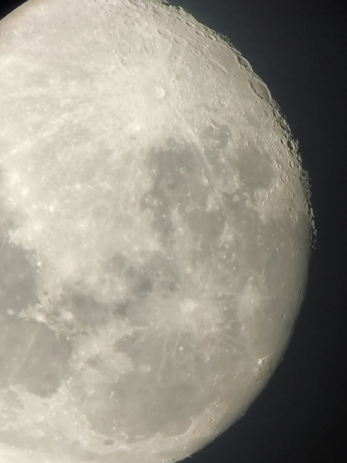 A close-up photograph of the moon's cratered surface against a dark sky, with the overlaid text 'i'm not crying, you're…
