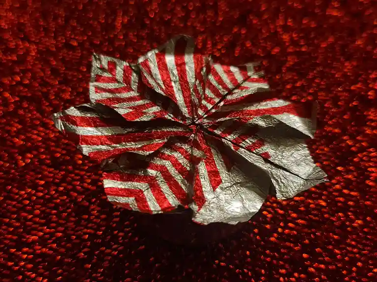 A flower made from a Tunnock's Tea Cake wrapper