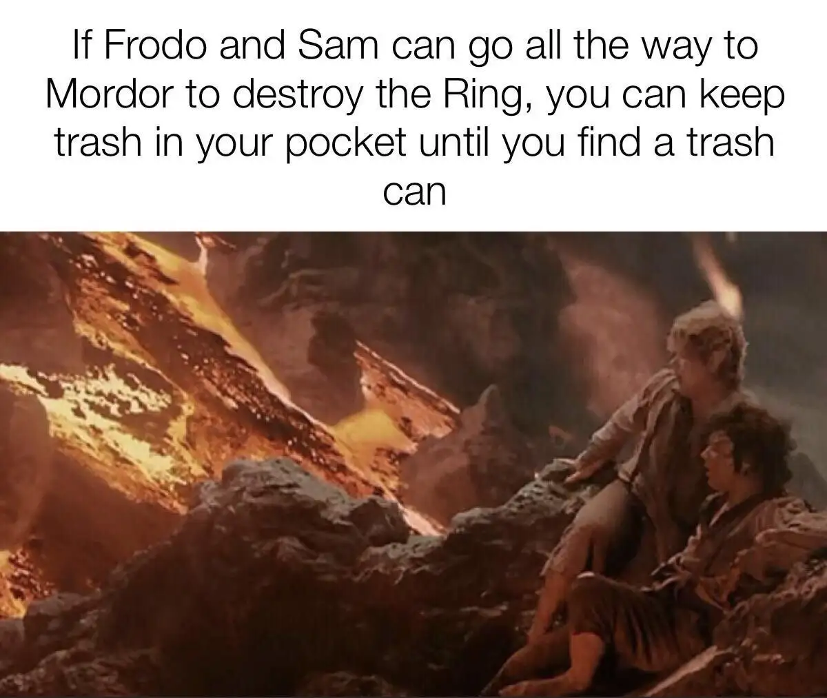 The image shows two characters, Frodo and Sam, sitting on rocky terrain with a fiery, volcanic landscape behind them. The…