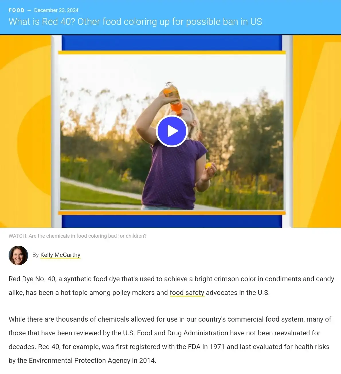 A screenshot of a news article about Red 40 food dye, featuring a video thumbnail of a young girl drinking orange juice…