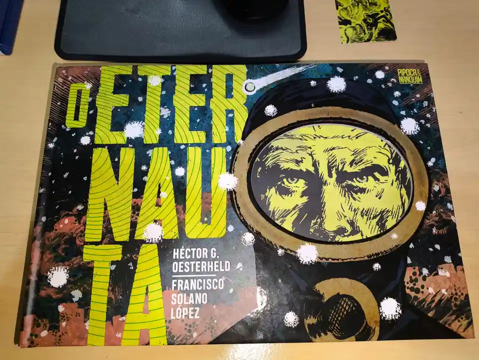 A comic book cover titled 'OETER NAUTA' featuring a yellow-hued astronaut's face in a helmet against a space background with…