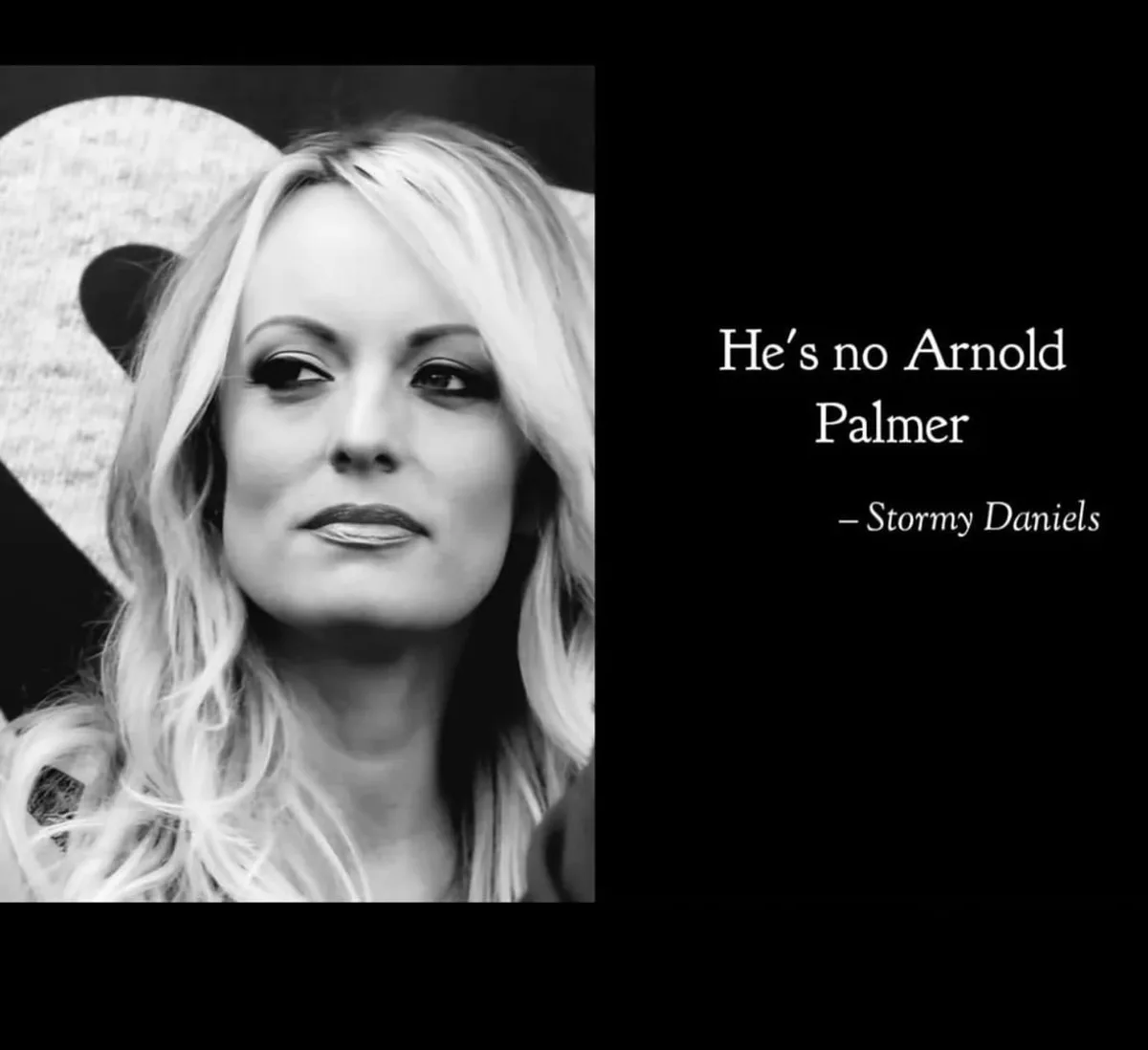 A black and white photo of Stormy Daniels, who has blonde hair and is wearing a large, textured heart-shaped hat. To the…