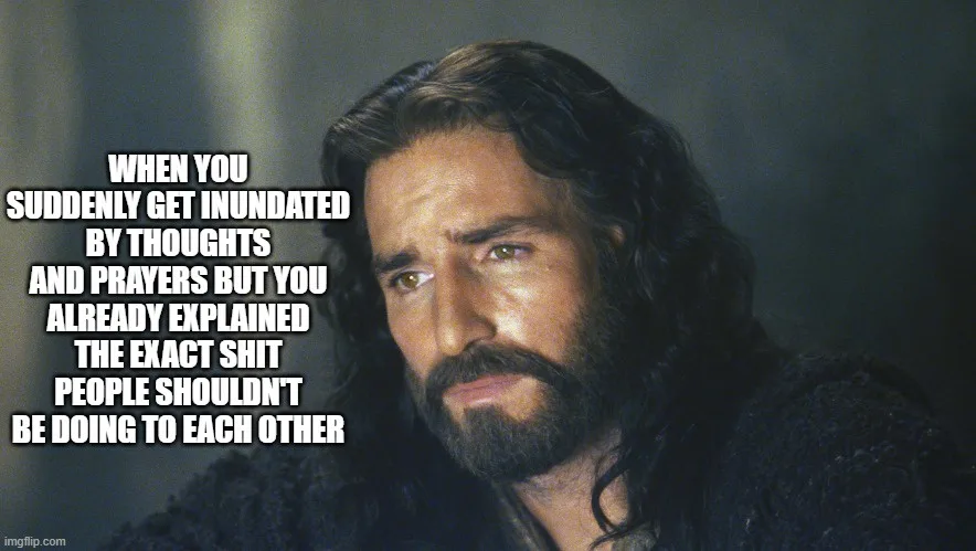 A close-up of a man with long dark hair and a beard, looking weary and exasperated. White bold text is overlaid on the left…