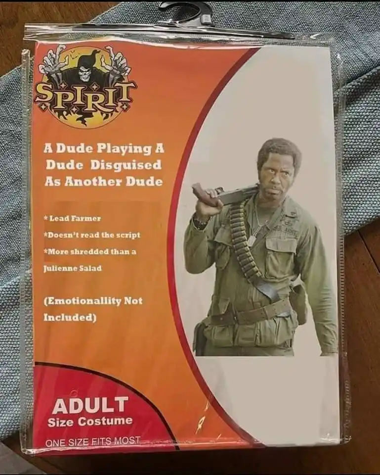 A Spirit brand adult costume package features a photo of actor Denzel Washington as a soldier holding a rifle. The packaging…