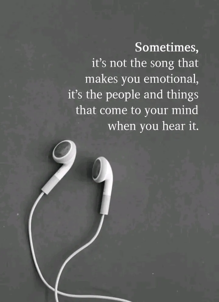 A black-and-white photo shows a pair of white wired earbuds lying on a textured gray surface. Overlaid in white text is the…