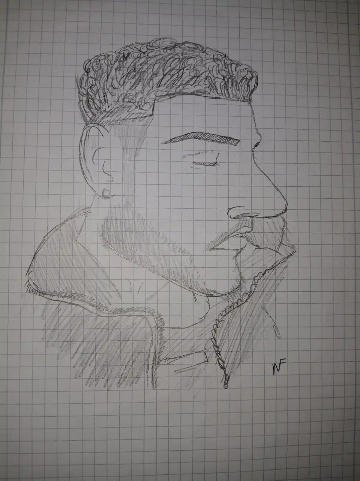 A pencil sketch on graph paper depicts a person in profile, showing curly hair, a visible ear with a small earring, and a…