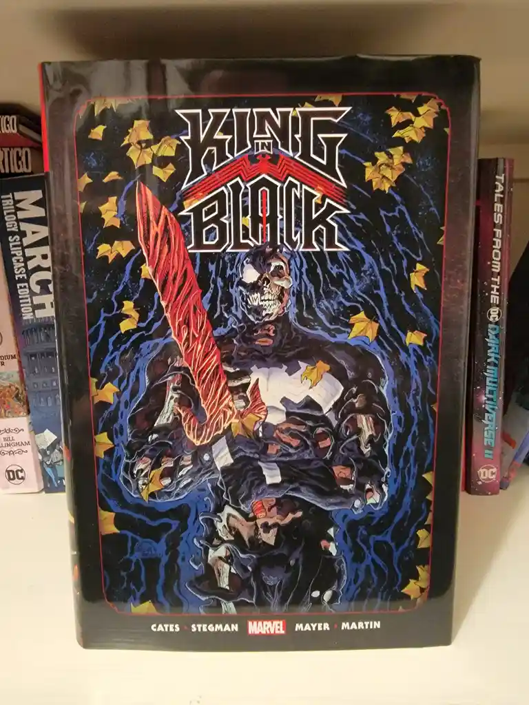 A comic book titled 'King in Black' by Marvel, featuring a dark, skeletal figure with a red sword amidst swirling blue…