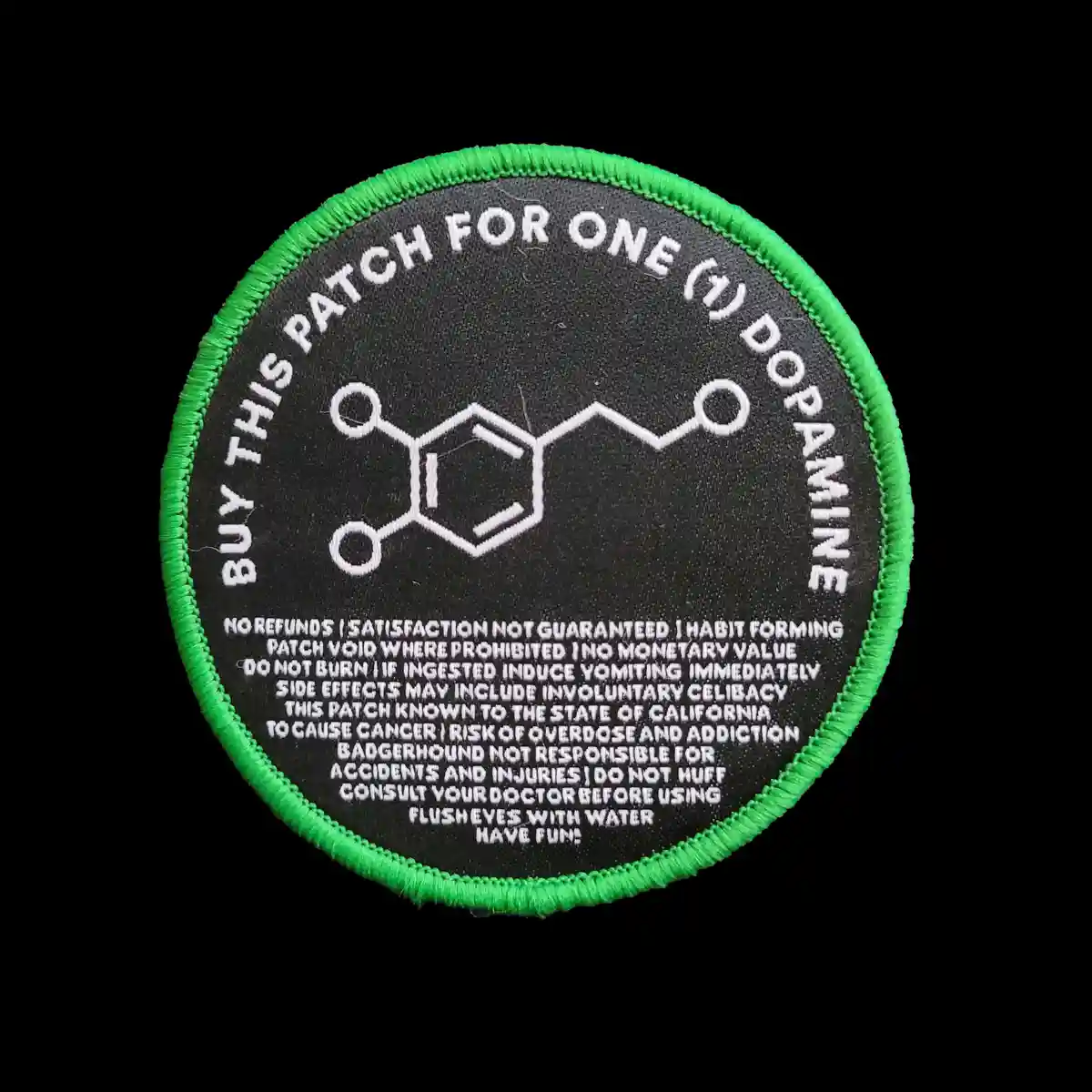 A circular black patch with a bright green border features a white embroidered dopamine molecule structure and text. The top…