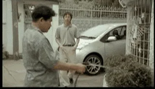A six-panel car commercial sequence: a man hands keys to a woman, they interact near a car, a woman gets in, a dashboard…