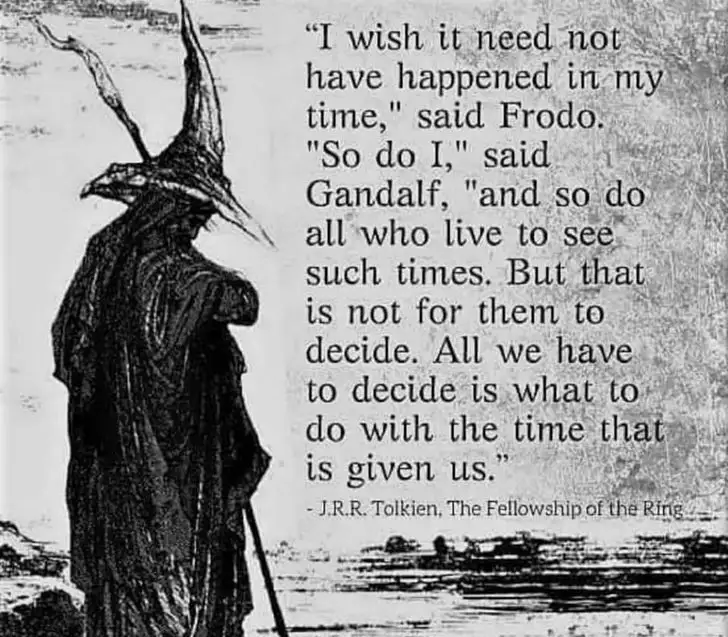 A black-and-white illustration shows a cloaked figure with a tall, pointed hat and a staff, viewed from behind, standing on…