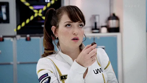 six sequential frames show a woman in a white and gold uniform with her hair in pigtails, reacting with escalating shock and…