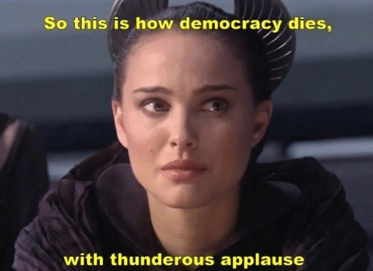A close-up of Padmé Amidala from Star Wars, looking concerned and slightly to her right, with yellow text overlaid at the…