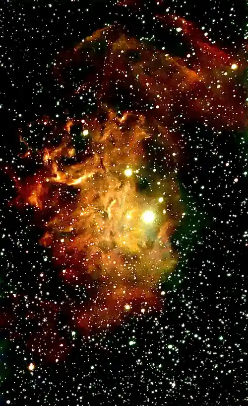 A cosmic nebula image with glowing orange and yellow gas clouds against a black background filled with stars. Overlaid text…
