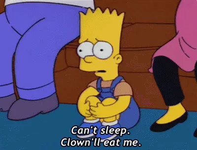 The image shows Bart Simpson sitting on the floor in front of a couch, visibly anxious and scared, with his arms wrapped…