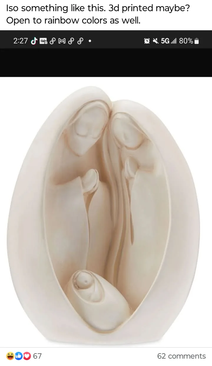 A minimalist, off-white, egg-shaped sculpture depicting a stylized nativity scene with Mary, Joseph, and the baby Jesus in a…