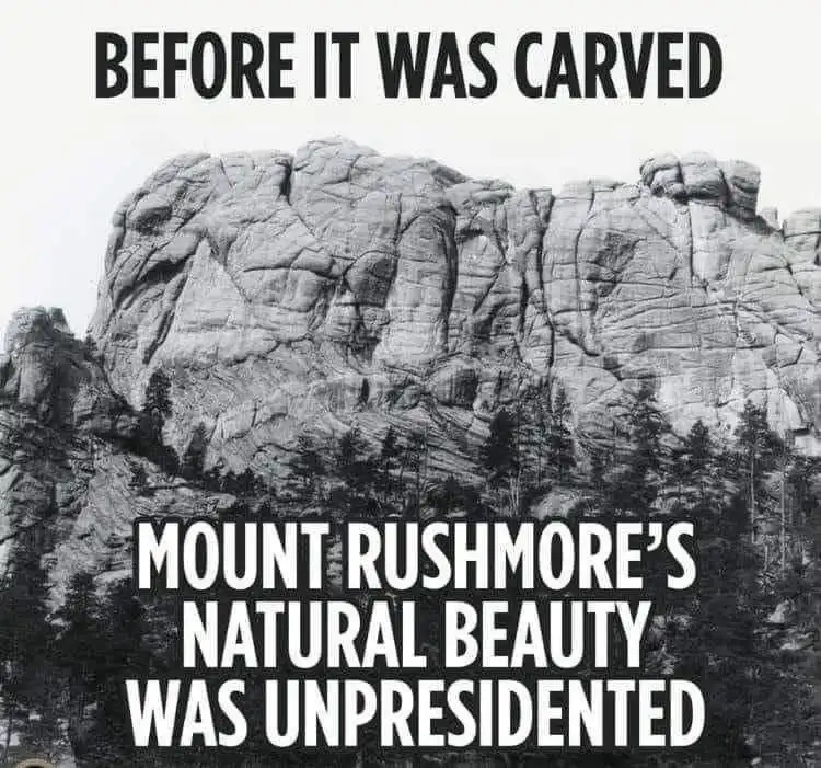 A black and white photo of Mount Rushmore before the presidential faces were carved, showing the natural rock formation and…