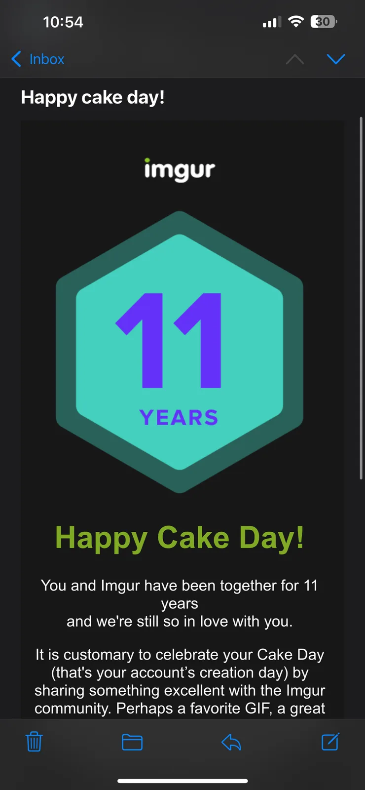 A screenshot of an Imgur app notification celebrating a user's 11-year anniversary with the platform, featuring a teal…