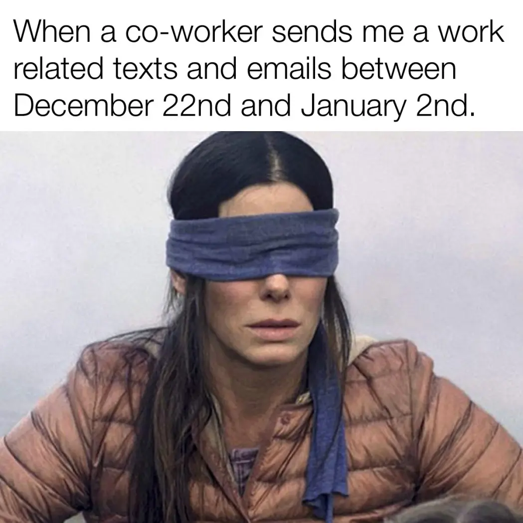 A woman with long dark hair wears a blue blindfold over her eyes while sitting in a brown puffer jacket. The text overlay…