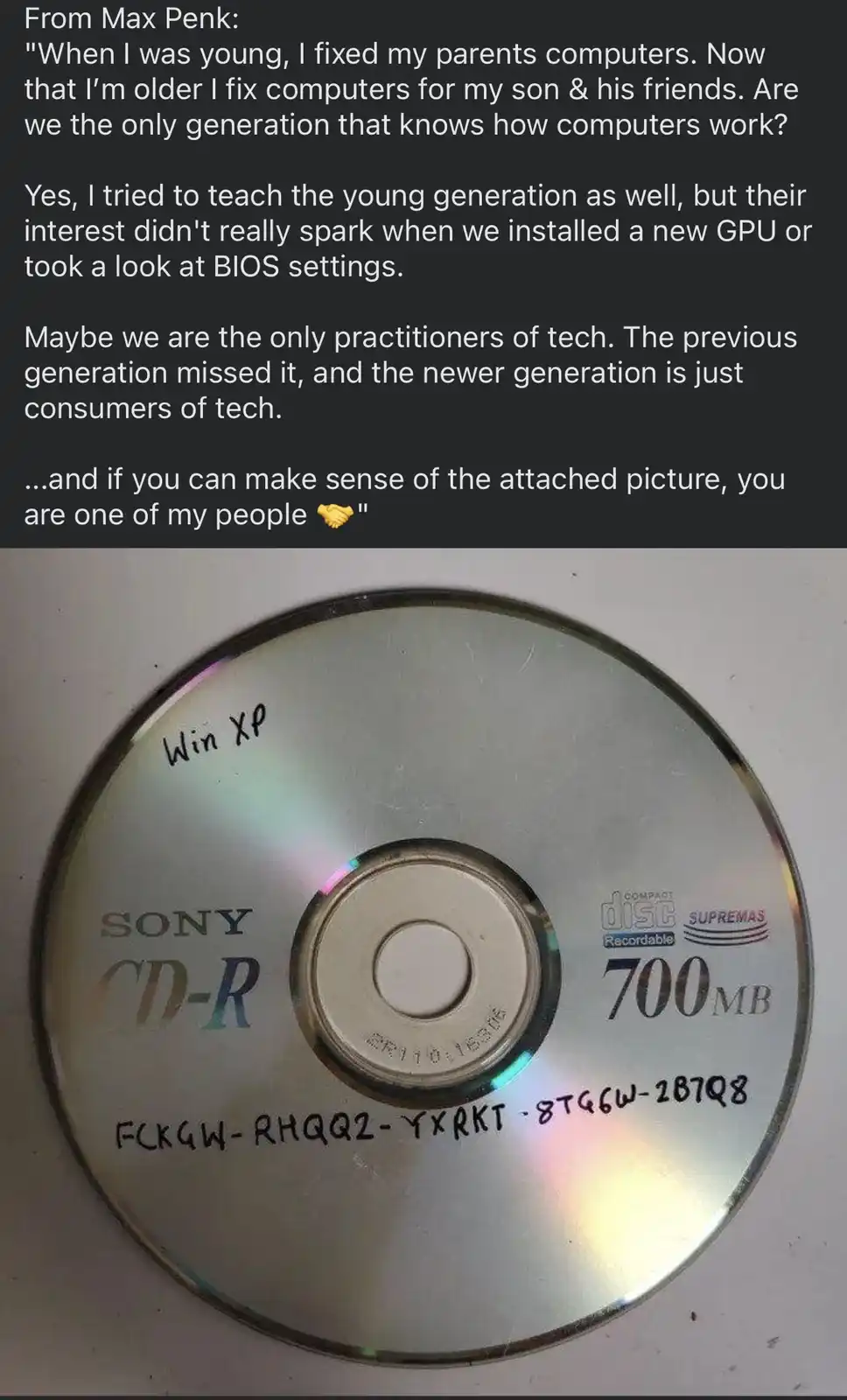 A close-up photo of a Sony CD-R disc with handwritten text reading 'Win XP' and a long product key. The disc is labeled…