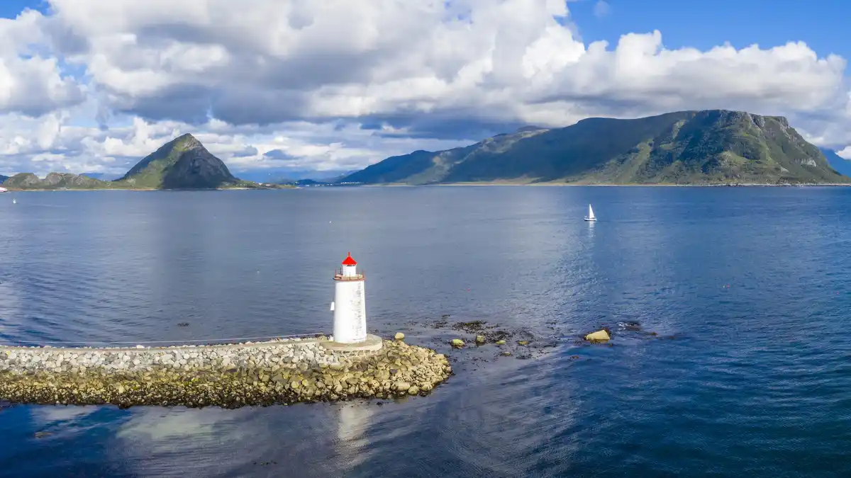 On Norway's majestic coast, this 1850s lighthouse shines brightly, automated since 1905. Built on a reinforced reef, it…