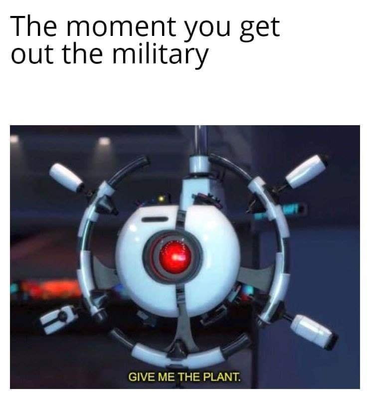 A white spherical robot with a red glowing eye and multiple mechanical arms is shown in a dimly lit room. The text at the…