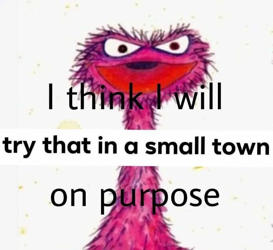 The image shows a close-up of the pink, furry, Sesame Street character, Abby Cadabby, with an angry, determined expression…