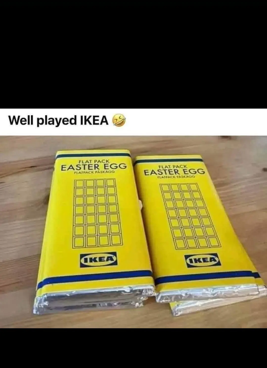 Two yellow flat-pack chocolate bars, styled like IKEA furniture boxes, are labeled 'FLAT PACK EASTER EGG' with the IKEA logo…
