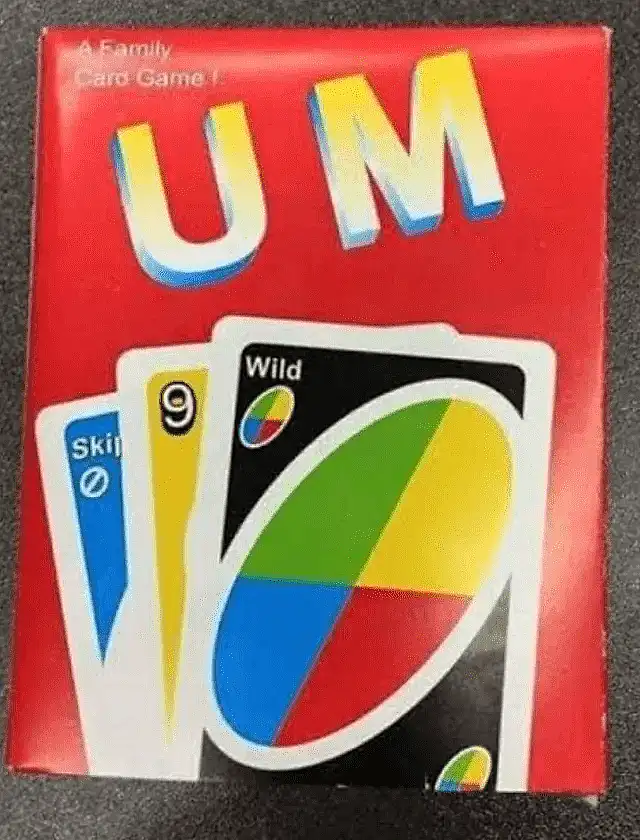 The image shows the red box of the UNO card game, with the large letters 'UM' superimposed over the top. Three UNO cards are…