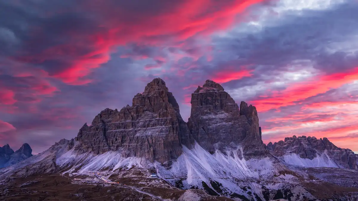 A trio of iconic alpine peaks, simultaneously known as Drei Zinnen, Tre Cime di Lavaredo, or Three Peaks of Lavaredo…