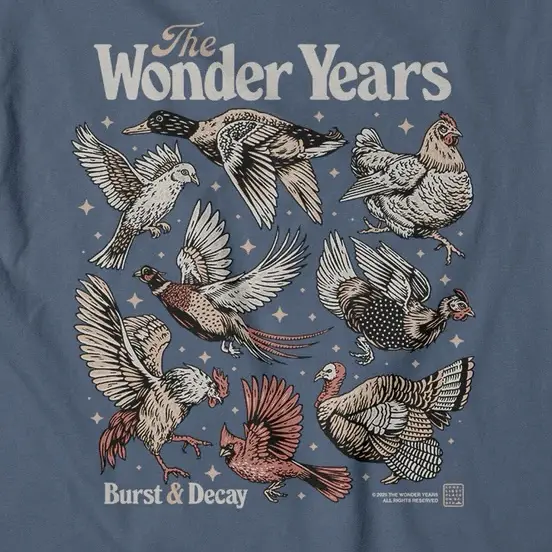 A blue t-shirt features a vintage-style illustration of eight different birds—duck, chicken, pheasant, turkey, cardinal, and…