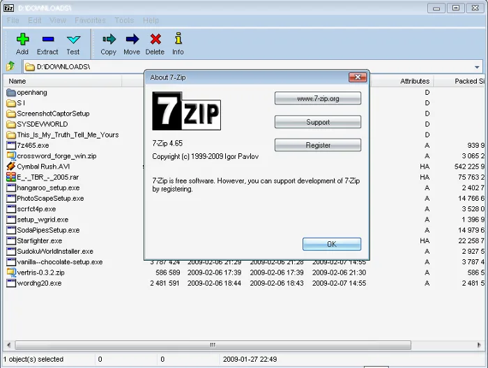 An 'About 7-Zip' dialog box is open over a 7-Zip file manager window showing a list of files in the 'D:\DOWNLOADS\' folder…