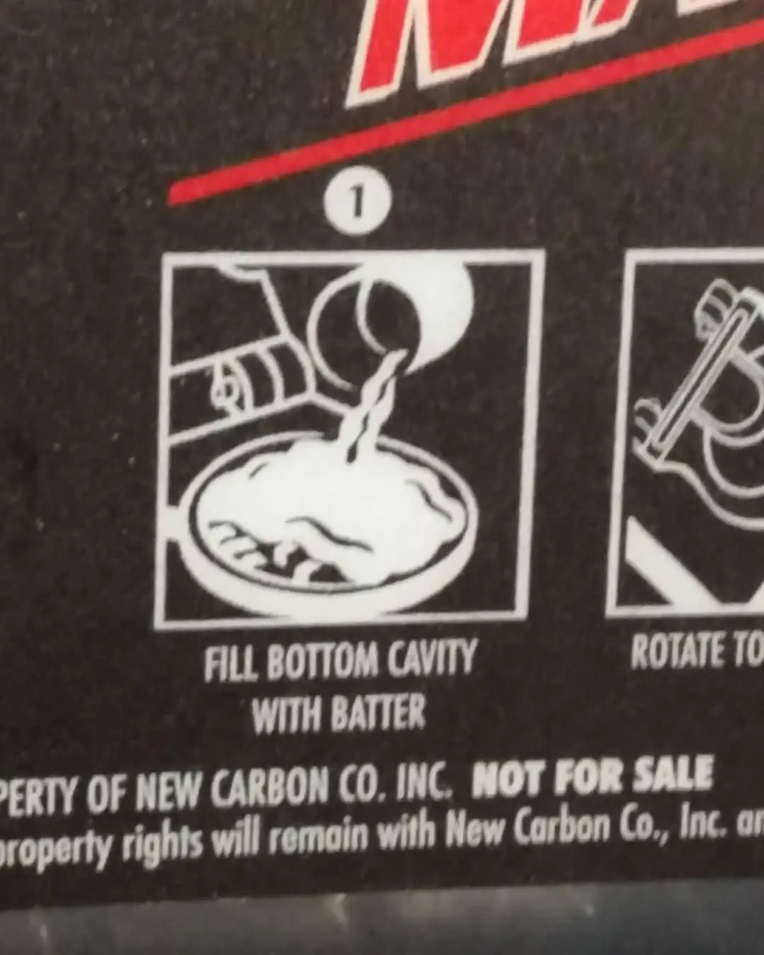 A close-up of a black instruction manual showing step 1: a white line drawing of pouring batter into a mold. Below the…