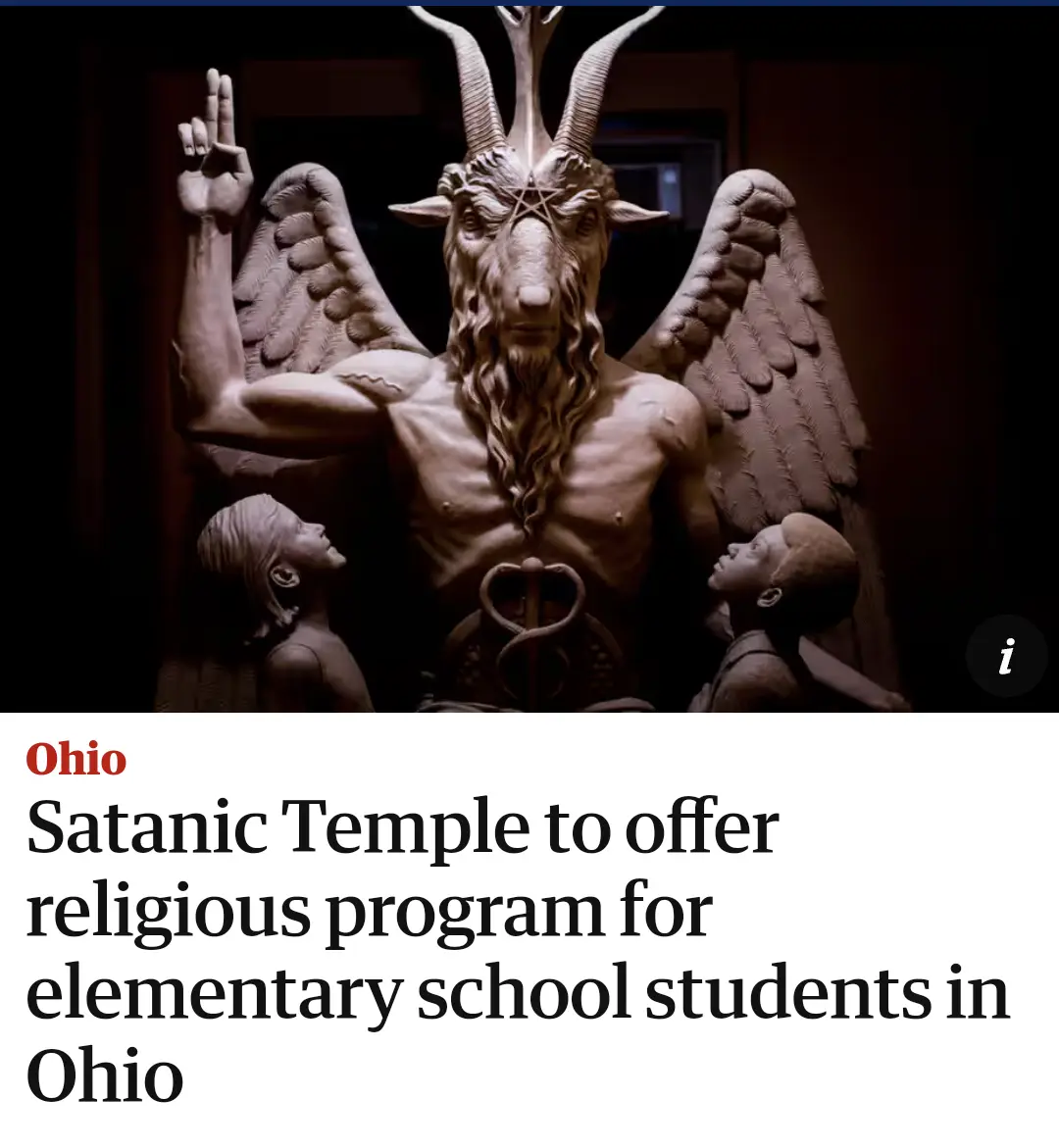 A stone statue of Baphomet, a goat-headed figure with wings and a pentagram on its forehead, stands with two children…
