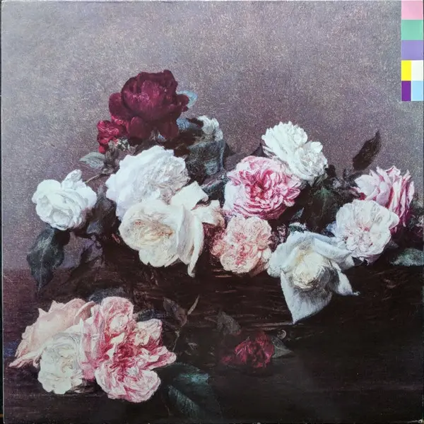 A classical still-life painting of a bouquet of roses in various shades of pink, white, and deep red, arranged in a dark…
