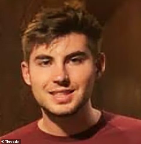 A close-up photo of a young man with dark hair and a slight smile, wearing a red shirt, with the overlaid text 'i'm not a…