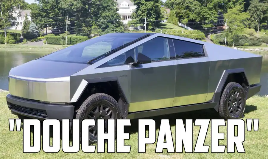 A silver, angular, futuristic-looking Tesla Cybertruck is parked on grass near a body of water with houses in the…