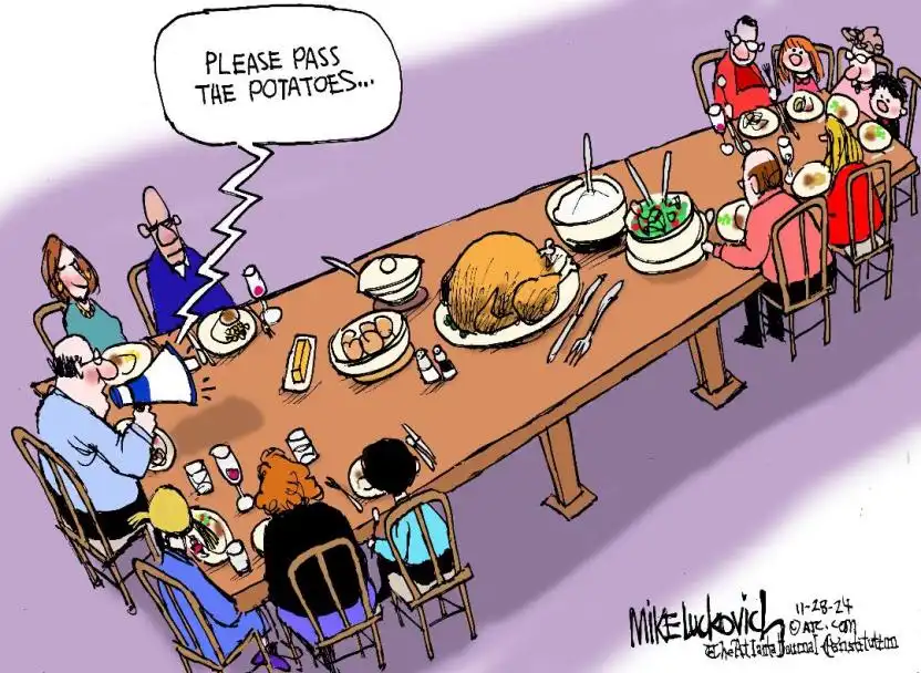 A cartoon depicts a large family gathered around a long dining table laden with food, including a roasted turkey, salad, and…