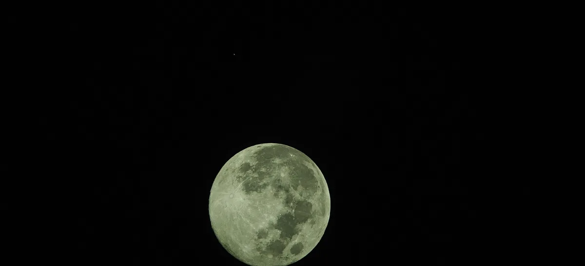 Journeying Between Mars and the Moon: A Cosmic Adventure