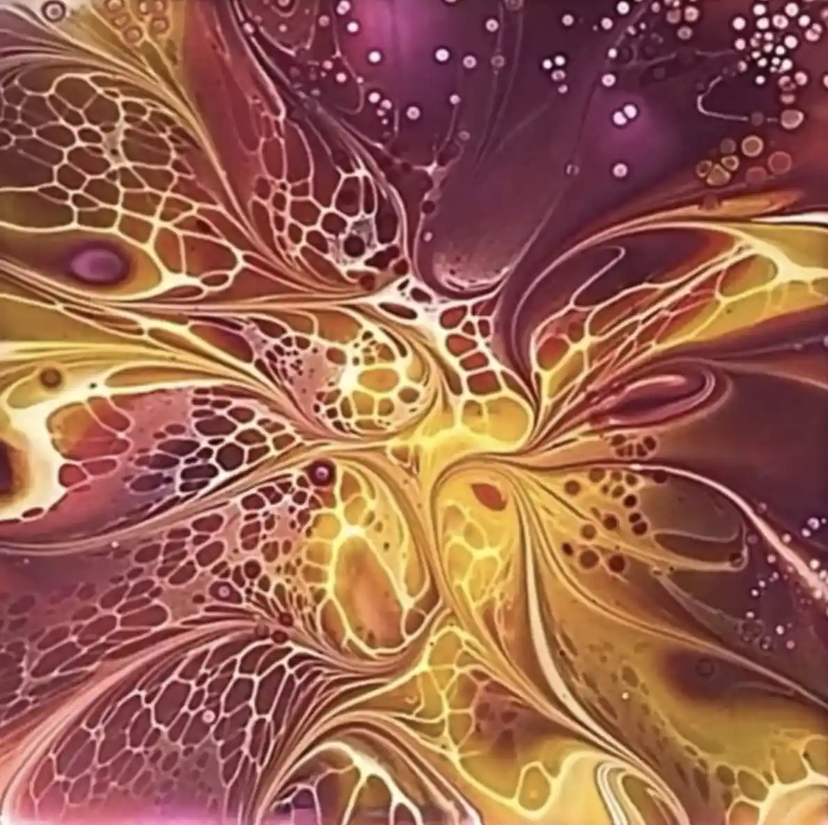 The image displays a vibrant abstract artwork featuring swirling patterns of gold, amber, and deep purple, resembling fluid…