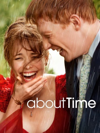 A man and woman are laughing joyfully in the rain, the woman in a red dress covering her mouth with her hand, the man in a…