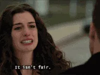 A six-panel GIF shows Anne Hathaway repeatedly saying 'It isn't fair.' with escalating expressions of frustration and…