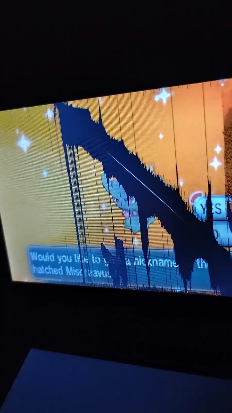 A screenshot of a Pokémon game screen showing a nickname prompt for a newly hatched Miscraevus, heavily distorted by…