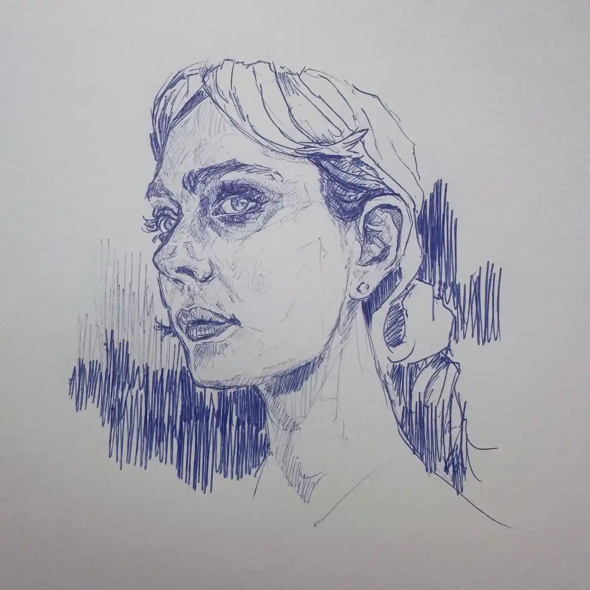 A blue ink sketch of a woman's face in profile, looking upward with a tearful expression, overlaid with the text 'i'm not…